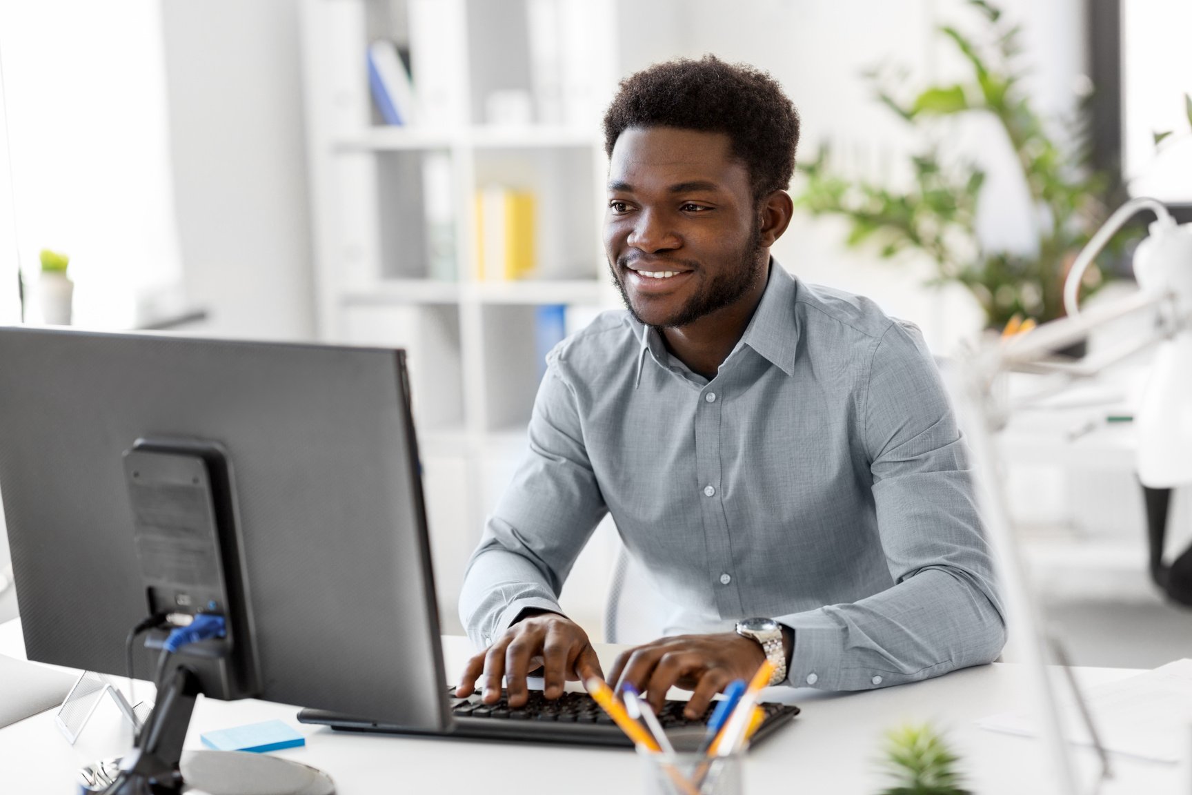 Happy Businessman Working at the Office